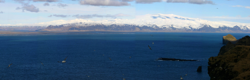Eyjafjallajökull and seabirds from klíf on Heimaey