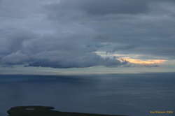 Clouds, shadows and the sea, sunset from Esja