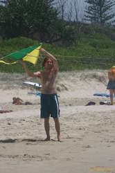 Damo tries to get a kite he built flying