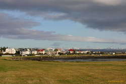 Colourful houses along the shore at Ægisíða