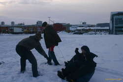 Karl and Lee pull Ute and Alda in sled races