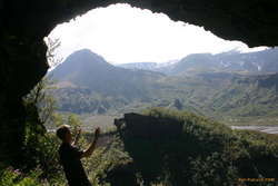 Sverrir in a cave way up the valley side
