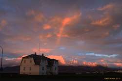 Afternoon rainbows over Höfði