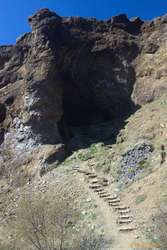 The track goes through the cave