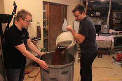 Pouring the wort back into kettle.